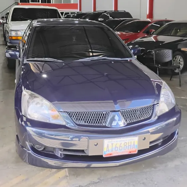 Sedã Mitsubishi Lancer 2014 en Caracas — foto 8
