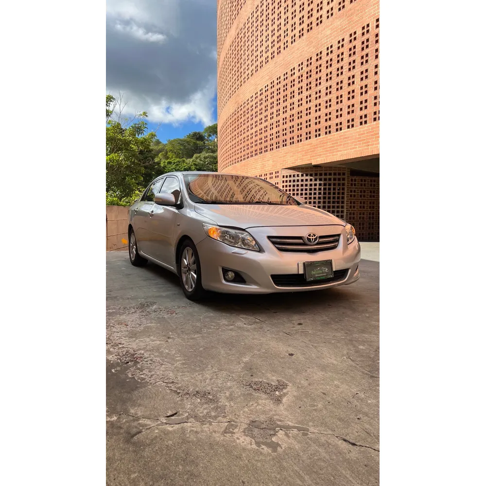 Sedã Toyota Corolla XEI 2009 en Caracas — foto 11