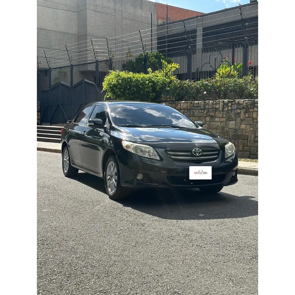 Sedã Toyota Corolla XEI 2009 en Caracas — foto 13