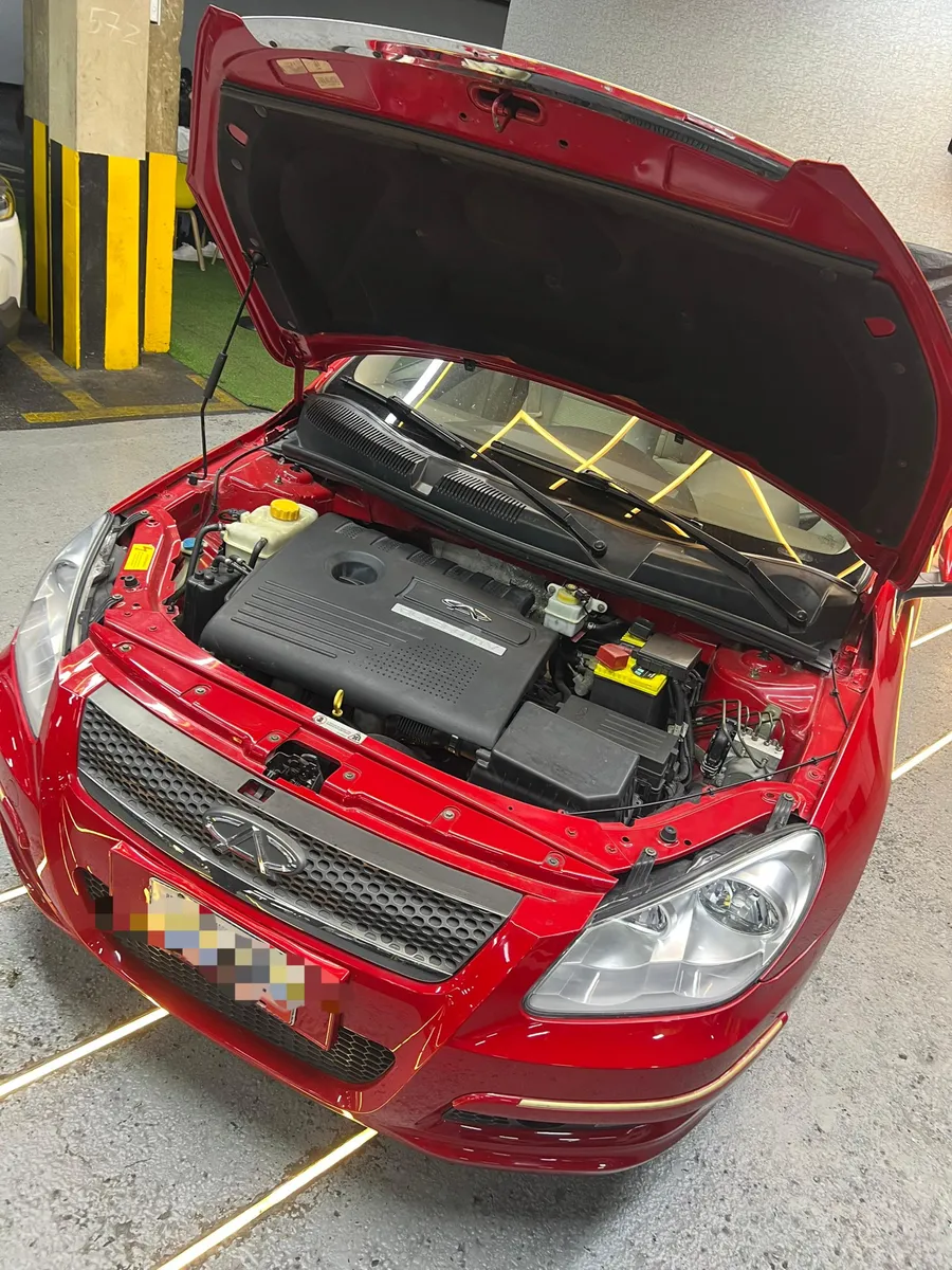 Chery Orinoco 2014 rojo sedan10
