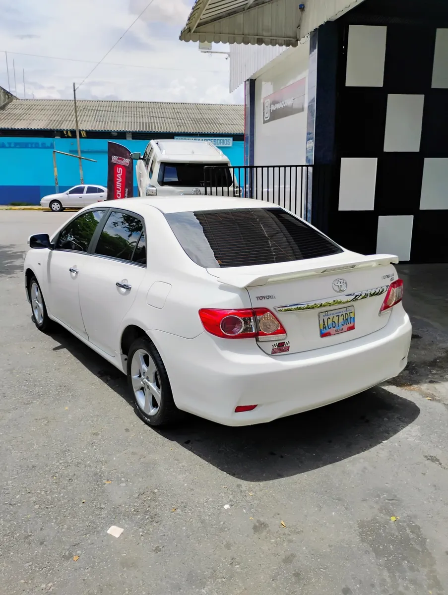 Toyota Corolla sedan 2014 blanco4